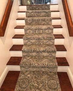 Stairs with floral pattern carpet